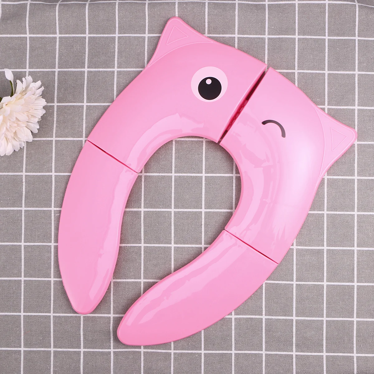 Składane, lekkie i przenośne nakładki na sedes do użytku w podróży, w domu, zimowe, dla dzieci, z motywem małych oczek, różowe.