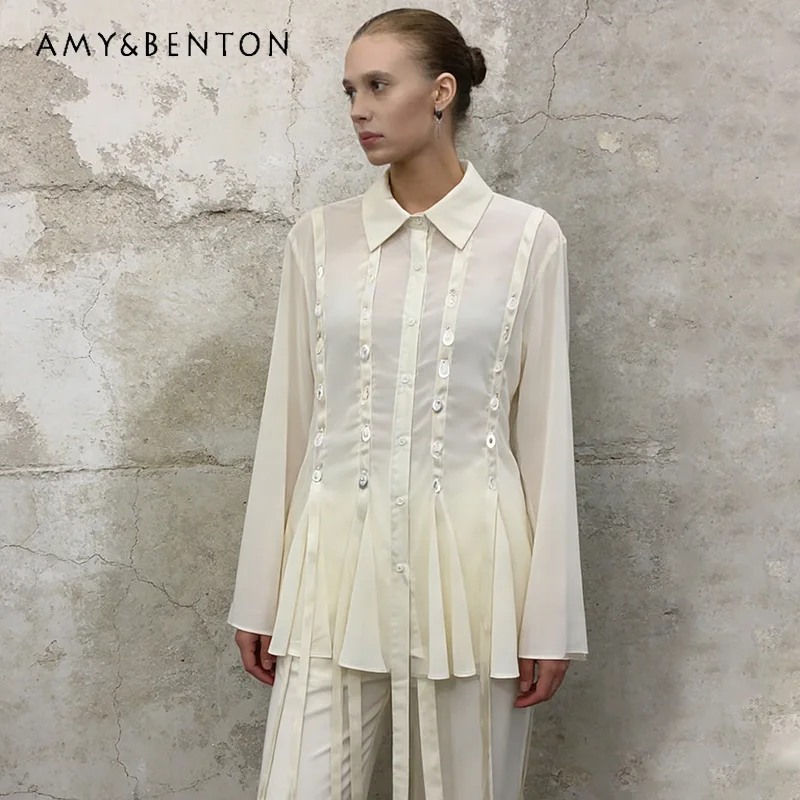 

Retro French Simple Style Women's Top 2026 Spring New Lapel Streamer Single-breasted Metal Sheet Splicing Design Shirts Ladies