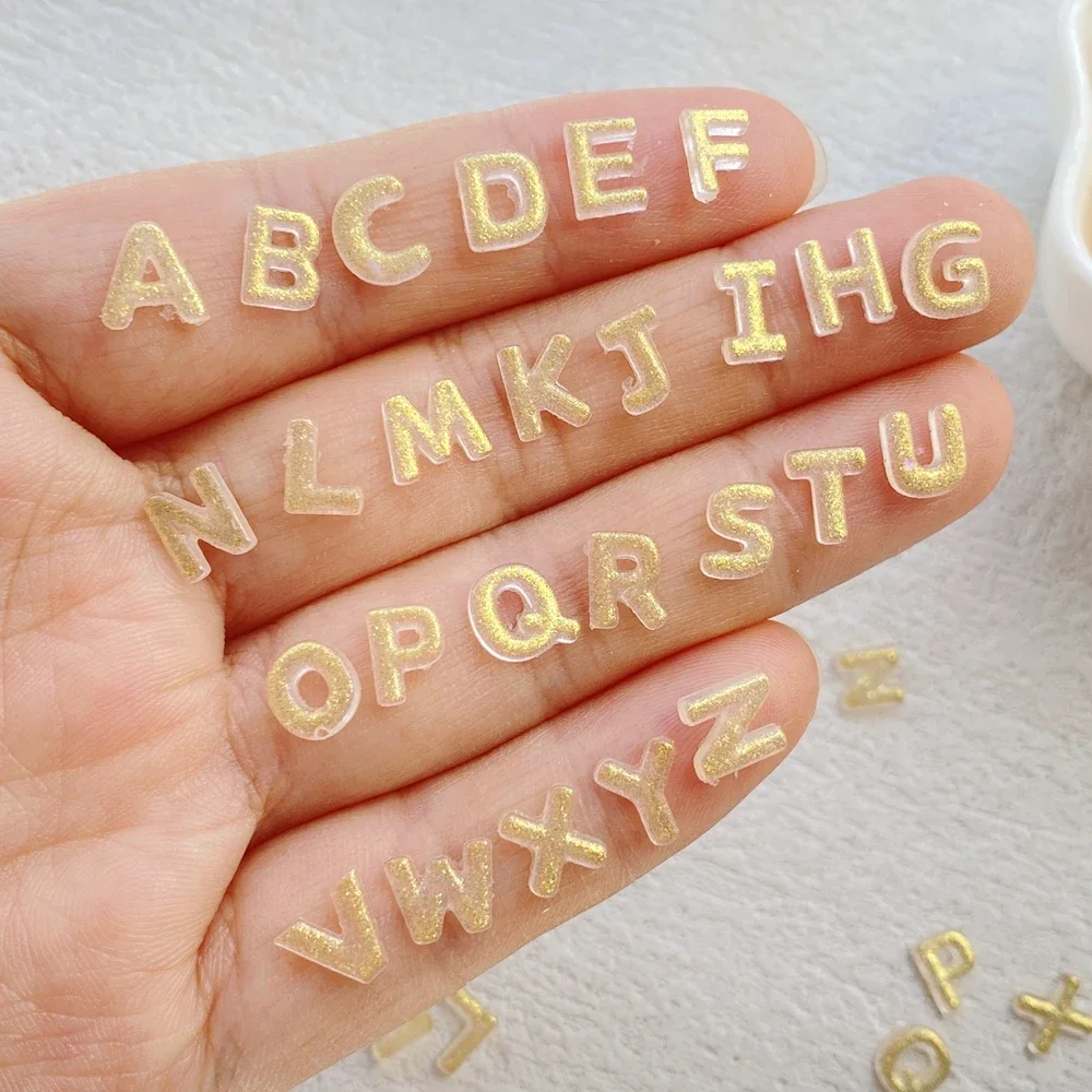 200 pçs resina mista mini dhining 26 letras douradas arte do prego parte traseira plana pedra apliques diy encantos de natal scrapbook decoração artesanato
