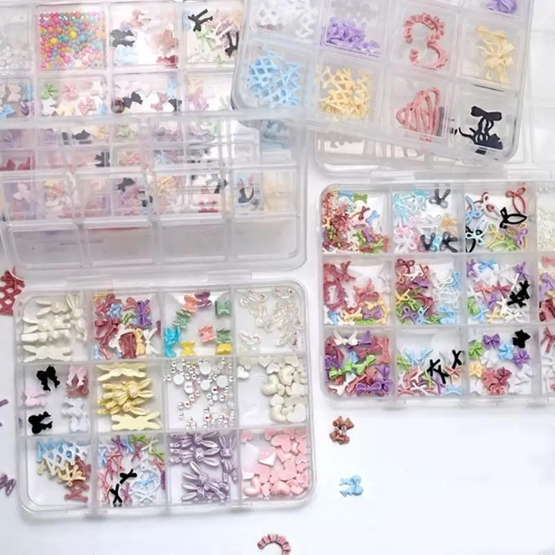 G99Eネイルチャームセット、弓蝶のハートネイルアートチャーム、カラフルなネイルアート用品