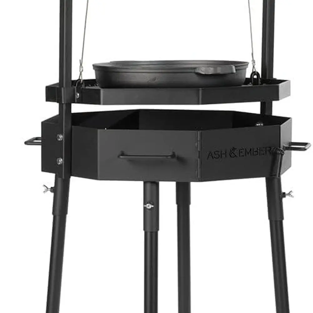 

Argentine-Inspired Santa Maria Fire Grill by Titan Great Outdoors, featuring Adjustable Grate, Cast Iron Skillet, and Flywheel C