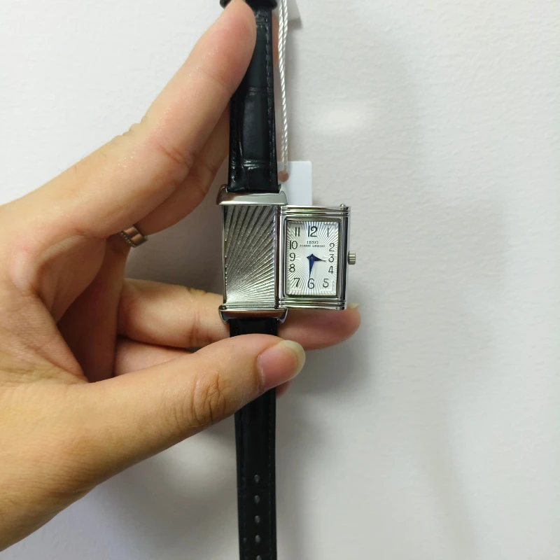 ساعة كوارتز نسائية مربعة كلاسيكية جديدة مع علبة قابلة للعكس وحزام جلدي ساعة فضية فريدة من نوعها 21*36 مللي متر