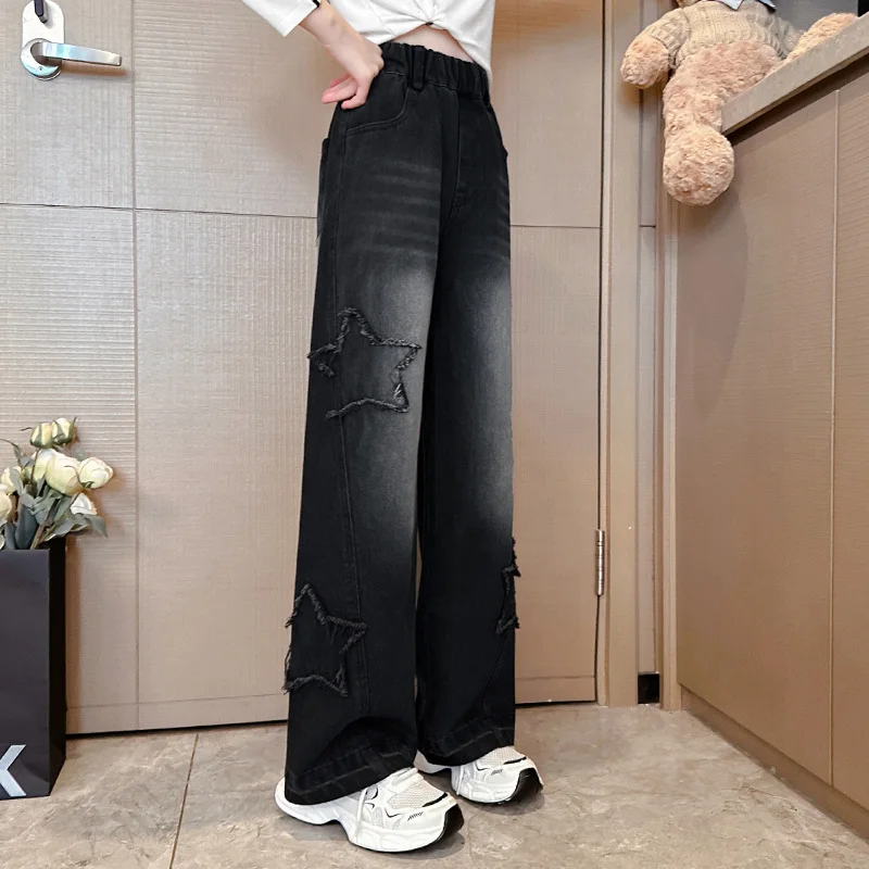 エレガントな子供黒色ジーンズ女の子のためのカジュアルストリートスタイルデニムパンツティーンエイジャー子供ファッションストレートジーンズズボンとスター