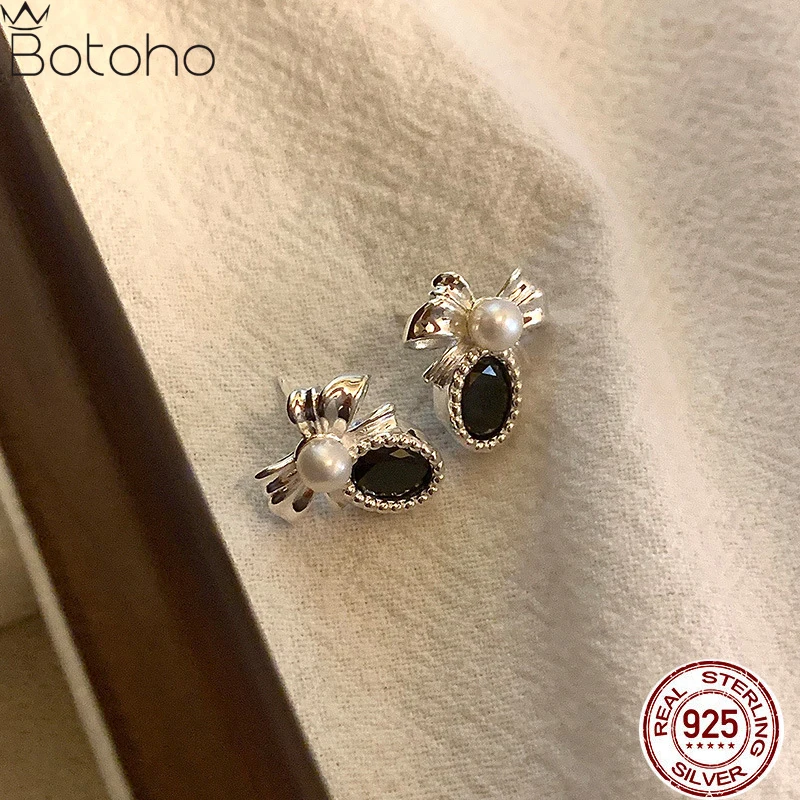 S925 Sterling Silver Bow Pearl Personalized Black Oval Zircon Earrings 2023 New Fashion Design Sense Small Group Ear Studs