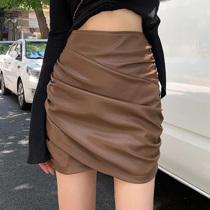 Casual irregular PU leather skirt 2022 autumn and winter new high waist pleated short skirt slimming hip skirt