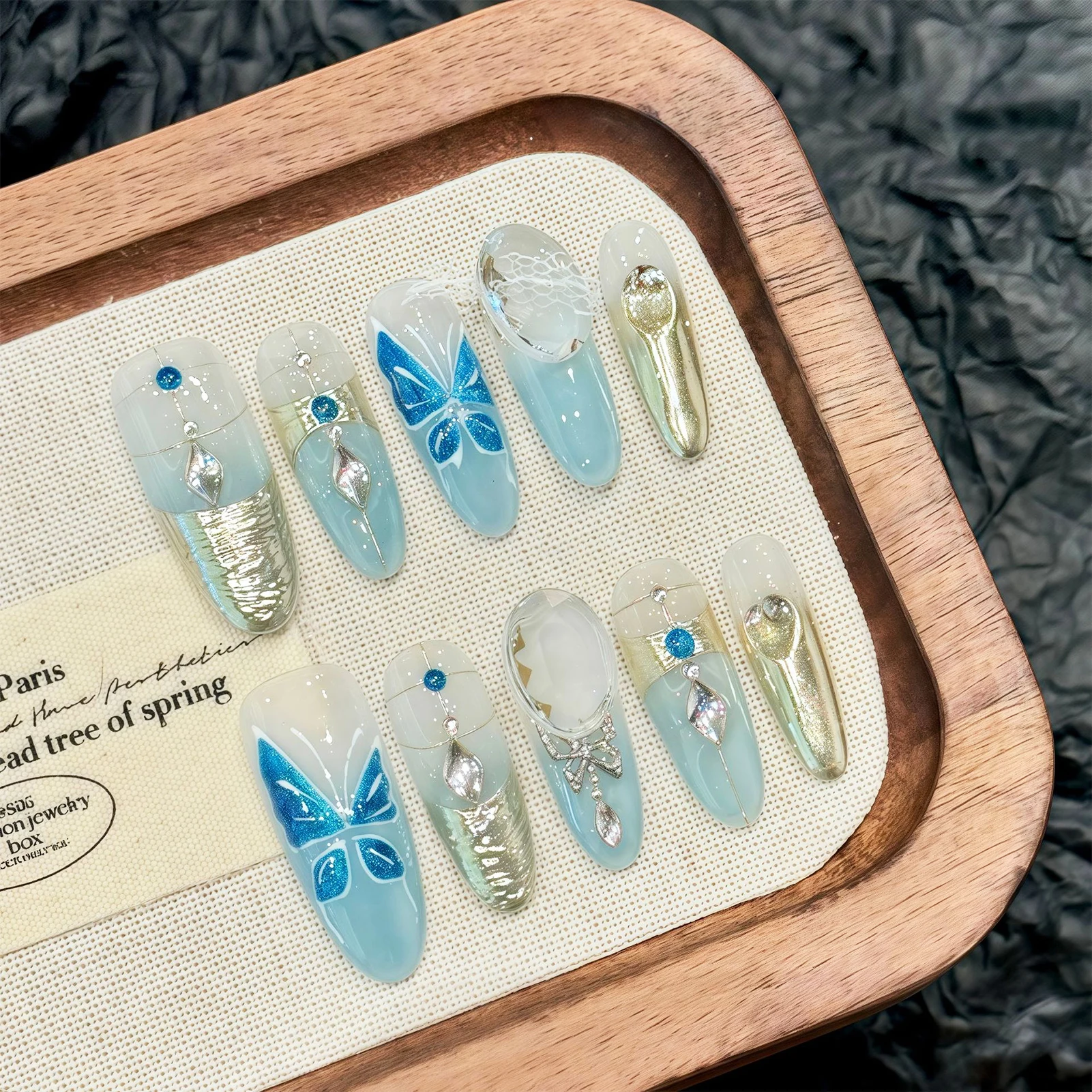 10 Uds. De uñas postizas hechas a mano con gradiente transparente de hielo, decoración de mariposa azul, uñas postizas largas de almendra fresca de estilo francés