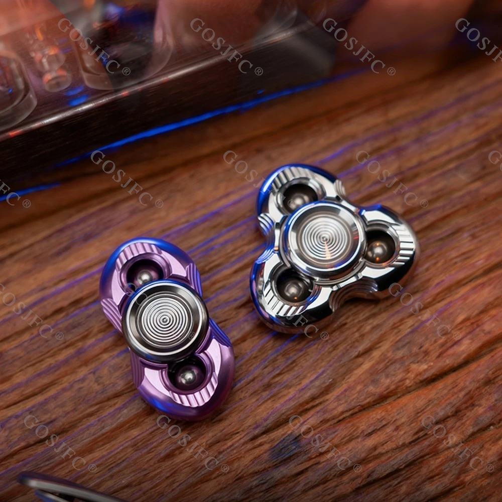 وسيم الرجل EDC جي ليان تململ سبينر الألومنيوم الفولاذ المقاوم للصدأ الدوران ثلاثة شفرات دفع الشعور تململ سبينر مكتب الملحقات