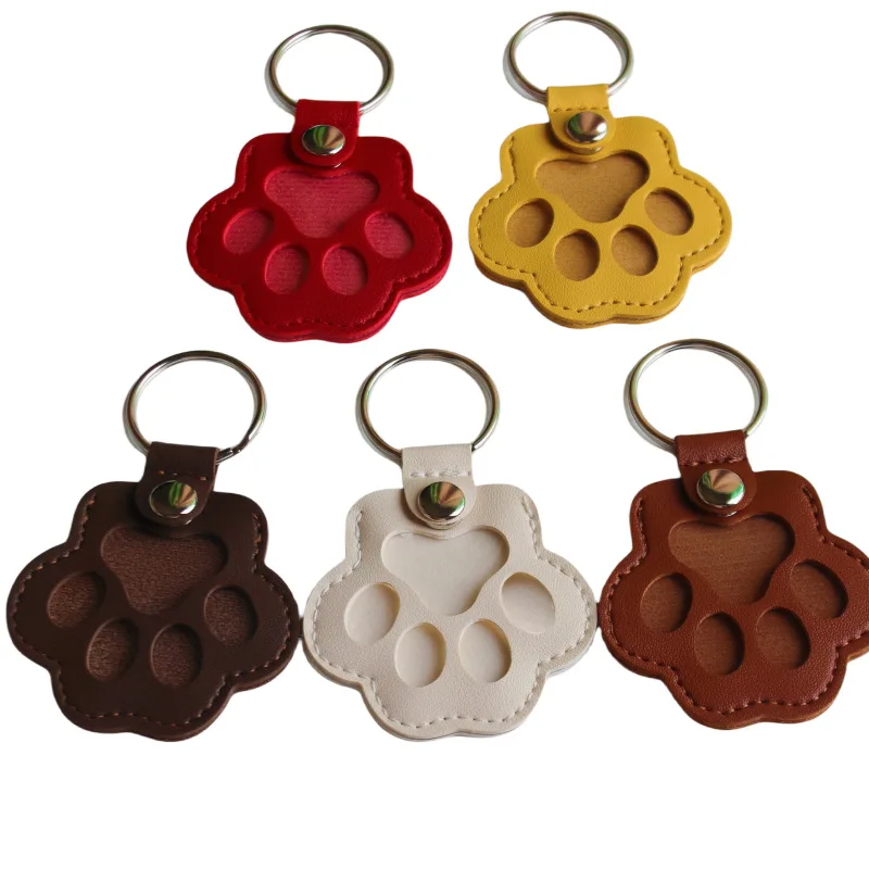 

Pet Dog and Cat Hair Storage Keychain. Pet Commemorative Hair Keychain. Cute Cat Paw Print Storage Case.