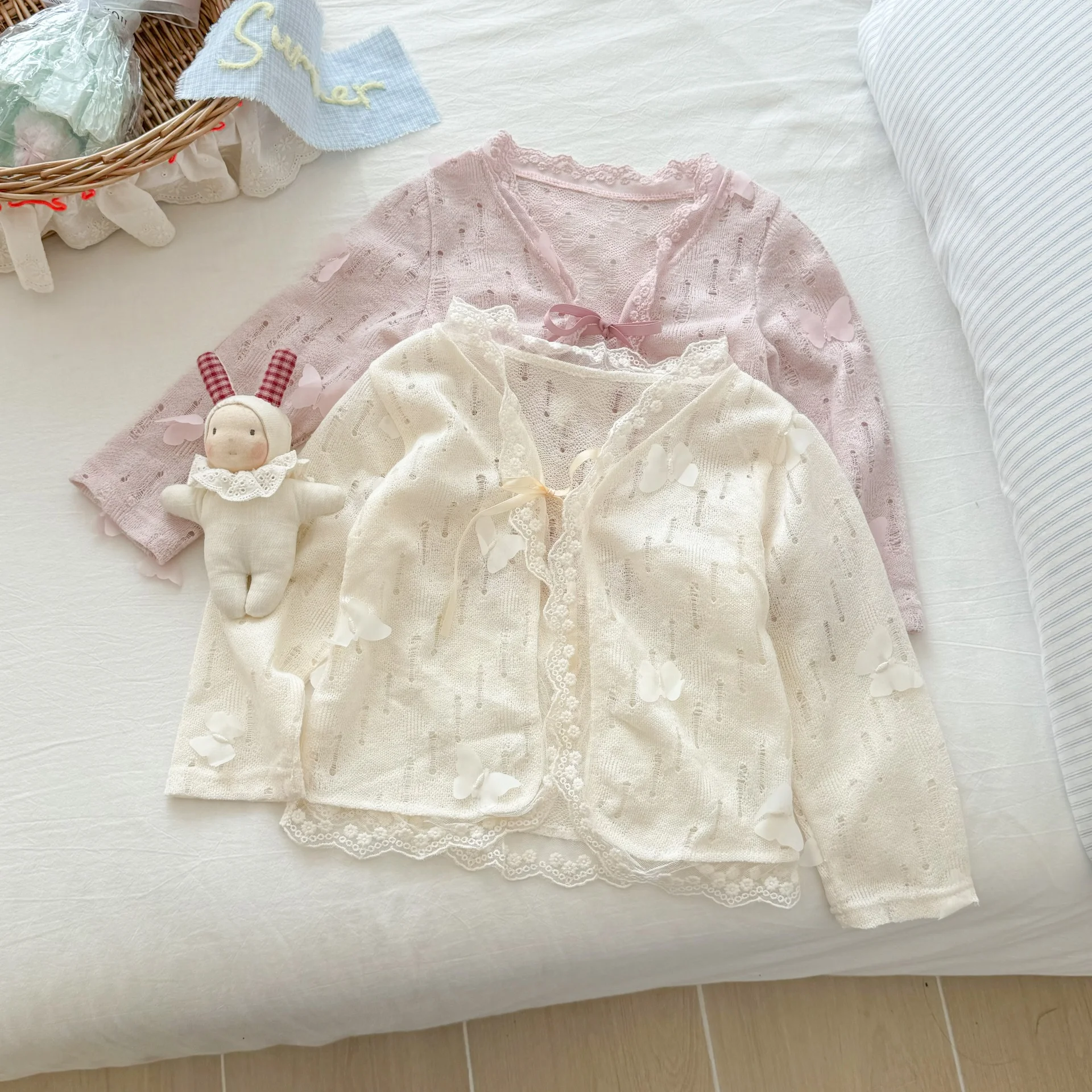 سترة صوفية محبوكة ناعمة بفيونكة جديدة للفتيات الصغيرات ملابس واقية من الشمس رقيقة للفتيات قمصان مفرغة لتكييف الهواء #3