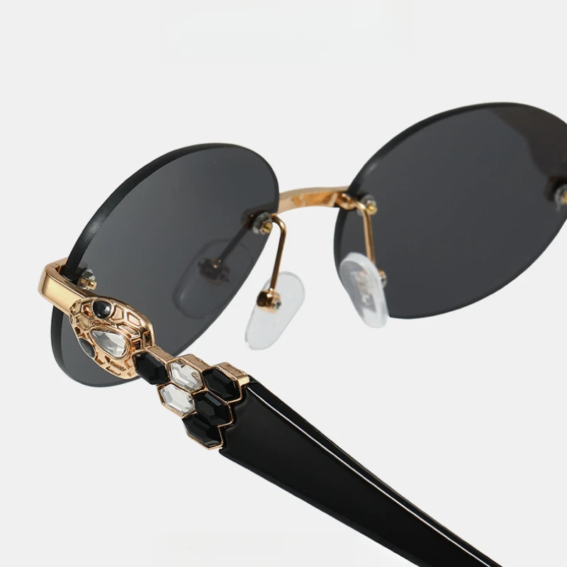 Luxury Brand Designer Sunglasses Women Snake Decoration Rhinestones Sun Glasses Ladies Fashion Oval Rimless Shades Female UV400