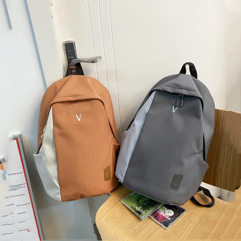 Fresh and sweet dumb dragon pendant waterproof backpack simple large-capacity computer backpack