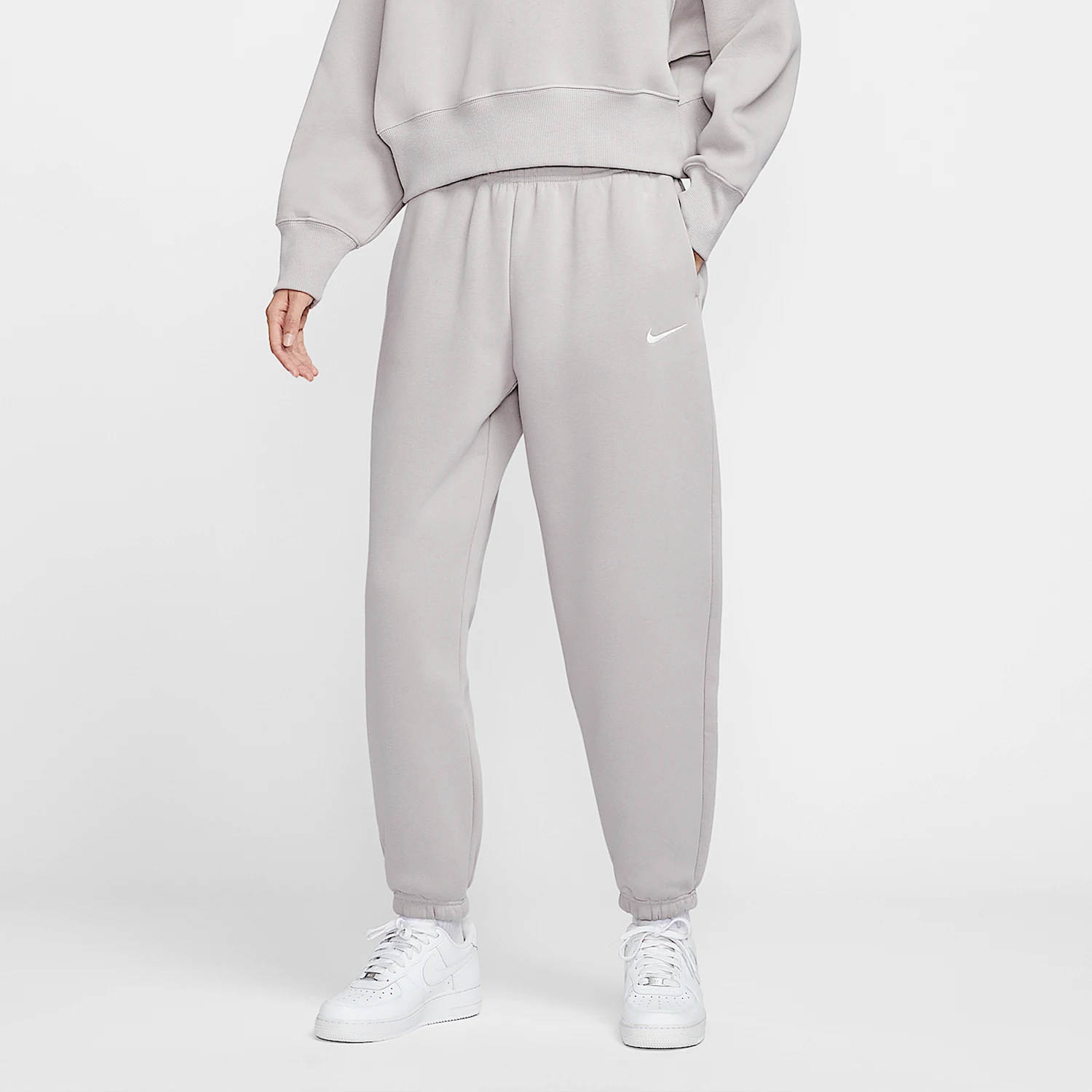 

Оригинальные женские спортивные трикотажные брюки Nike на флисовой подкладке FZ5997-009