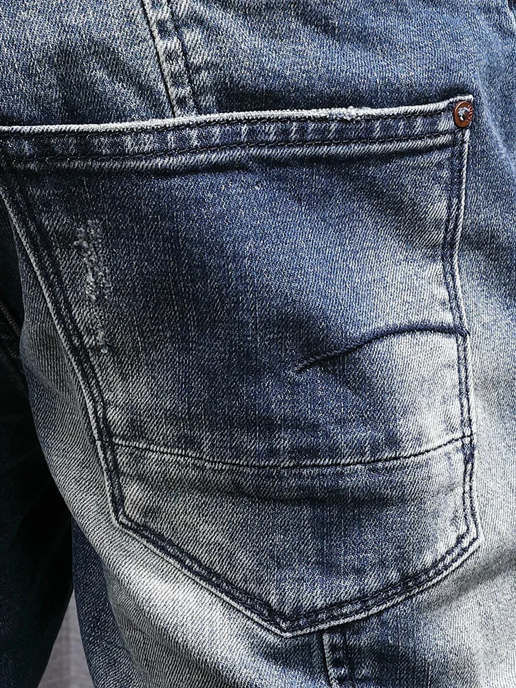 Herfstmode herfstmode Splicing retro blauwe slim fit jeans heren motorfietsstijl nostalgische gewassen broek met kleine pijpen