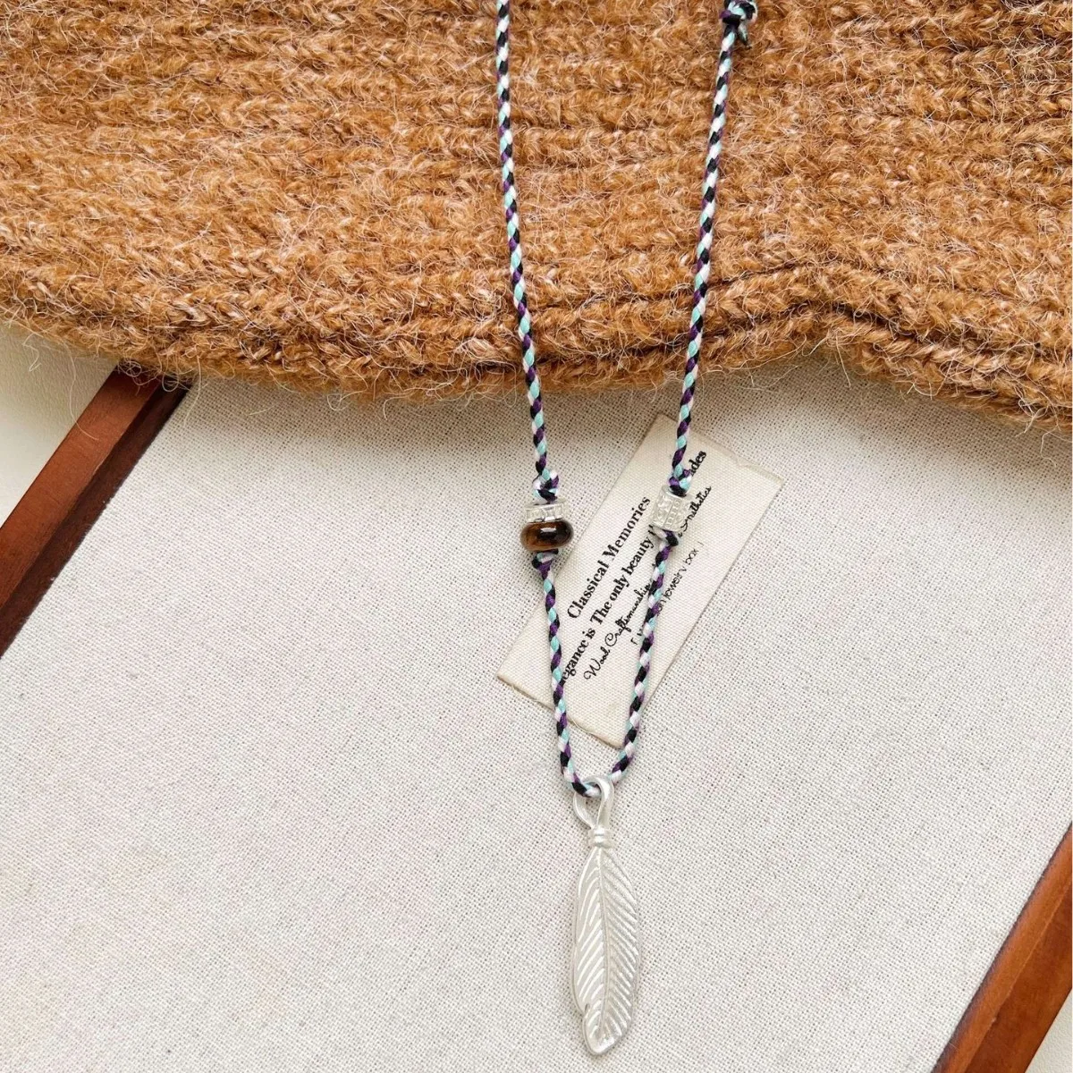 Niche metal feather pendant necklace niche design drawstring accessories