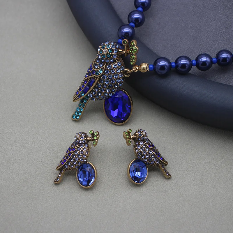 Set of Magpie Necklace, Earrings, and Brooch - Premium Blue Glass Pearl with Antique Gold Plating view 5