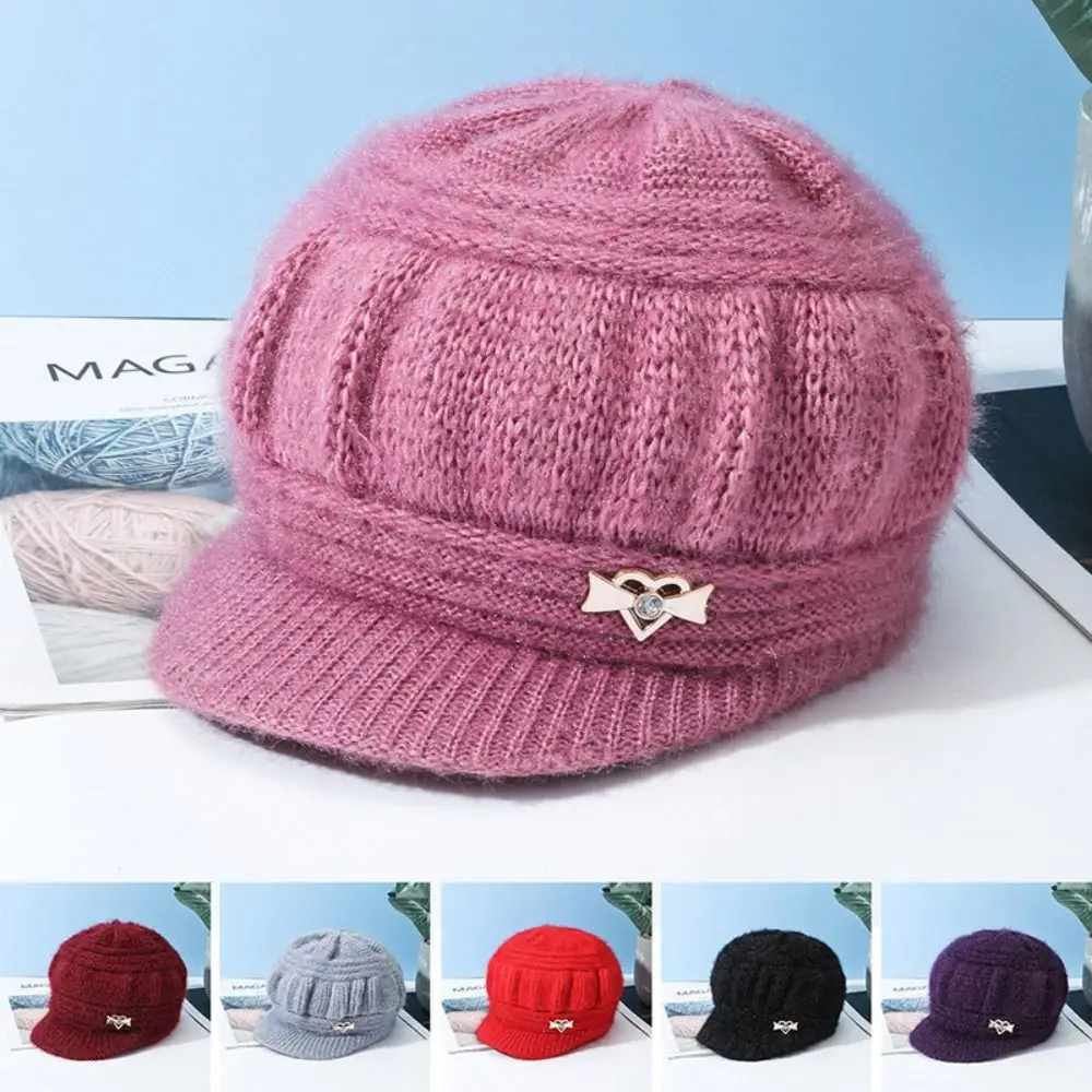 Cappello lavorato a maglia moda paraorecchie tenere in caldo berretto con visiera cappello berretto con zucca antivento donna