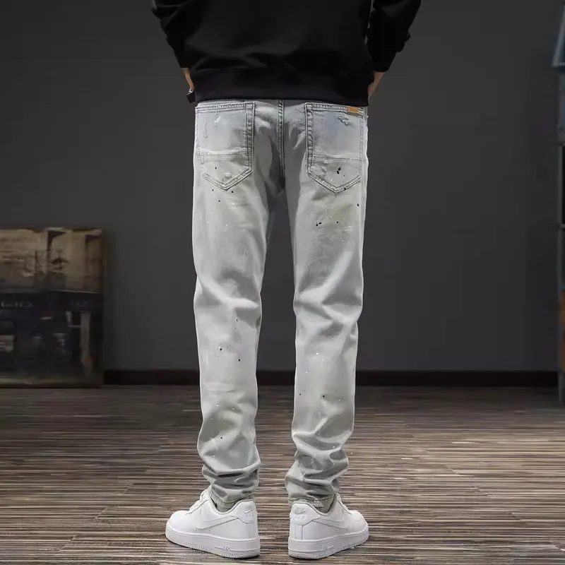 Korean fashion designer men's blue jeans retro elastic slim fit patchwork retro jeans men's casual denim pencil pants hombre