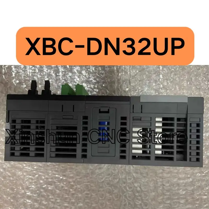 تم اختبار وحدة التحكم القابلة للبرمجة XBC-DN32UP المستعملة بشكل جيد وشحنها بسرعة