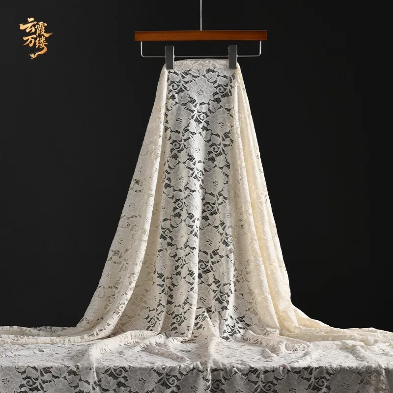 Three-dimensional lace hollowed-out mesh fabric can be cut into hand-crafted dress for fashion designers