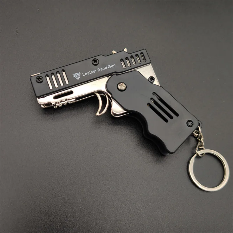 Pistola de banda de goma plegable, pistola de banda de cuero de 6 disparos, pistola de Metal de Semi-aleación, colección de juguete, regalo, pistola de bala suave