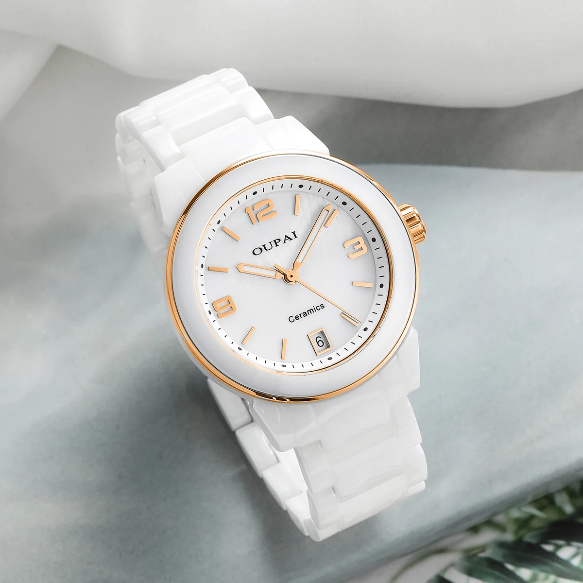 

Часы OUPAI с круглым циферблатом, женские, с керамической шкалой и стразами, изысканные, светящиеся, водонепроницаемые, с календарем, модные и элегантные.
