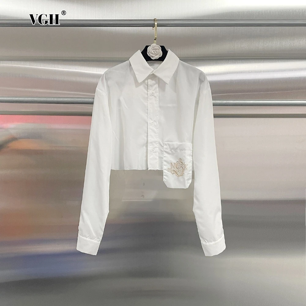 

VGH White Casual Asymmetrical Spliced Pocket Blouse for Women Lapel Long Sleeve Temperament Short Design Shirts Female Fashion