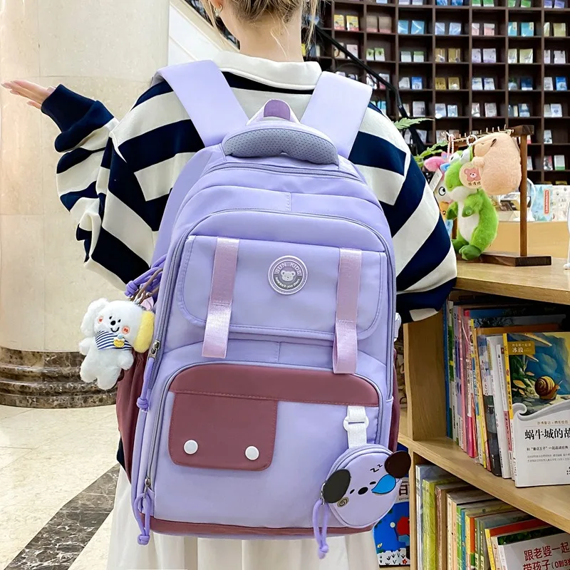 traveasy-brand-2026-new-girls-cute-color-block-backpack-nylon-with-plush-pendant-fresh-campus-casual-daypack-for-students