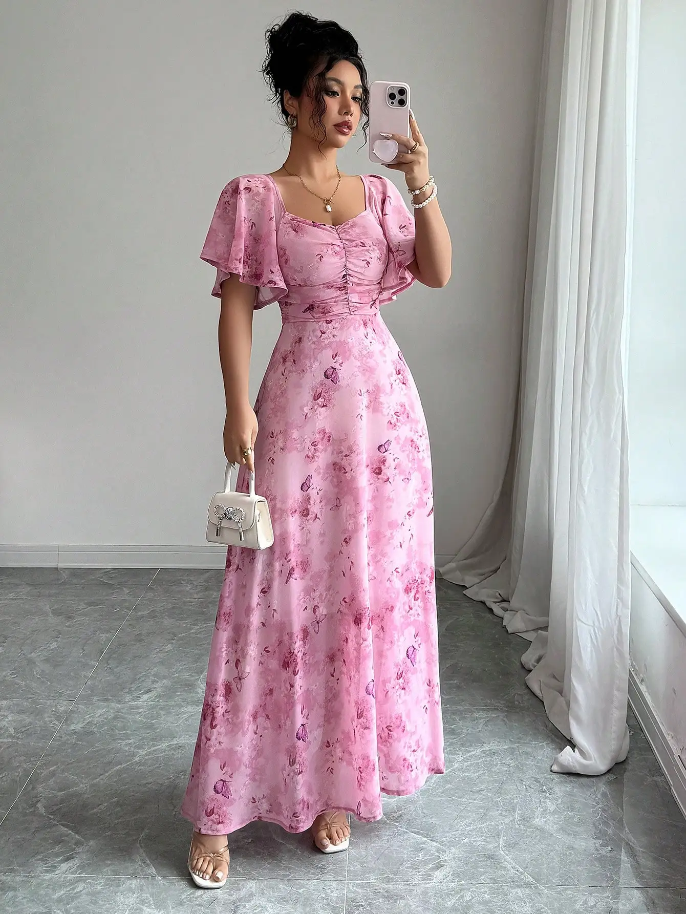 

Pink Floral Chiffon Maxi Dress with Ruched Bodice and Flutter Sleeves