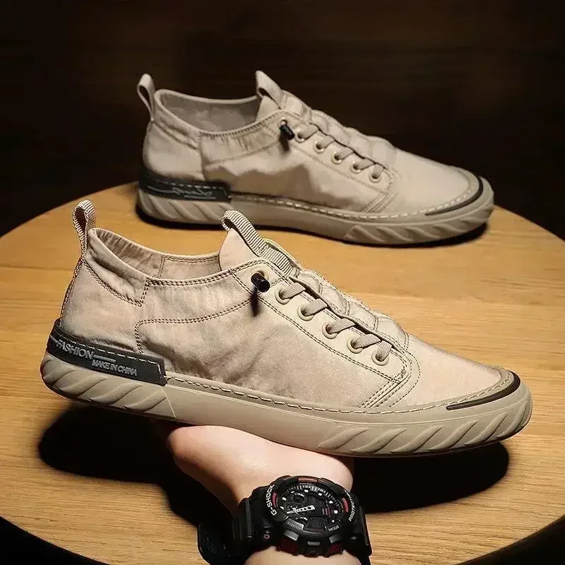 Scarpe casual da uomo Scarpe di tela in tessuto di seta di ghiaccio Scarpe da ginnastica 2024 Nuovo in slip traspirante su mocassini piatti da uomo