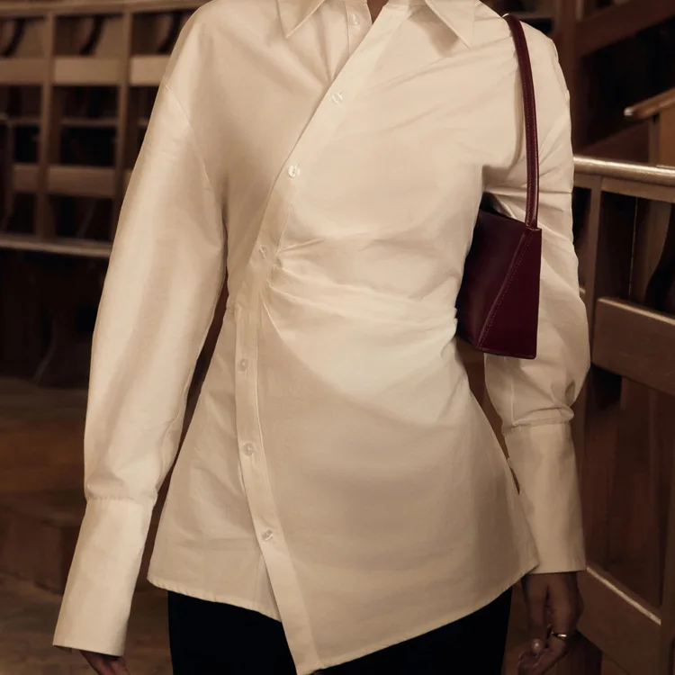 2025 nouveau coton blanc revers à manches longues taille cintrée femmes chemise conception croisée irrégulière Cardigan haut