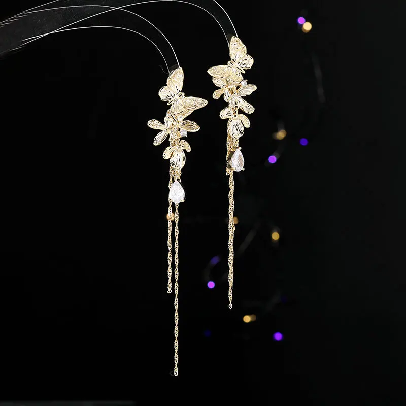 Pendientes largos de lujo para mujer, aretes de borla de flor de mariposa, aguja de plata, circón, viento frío