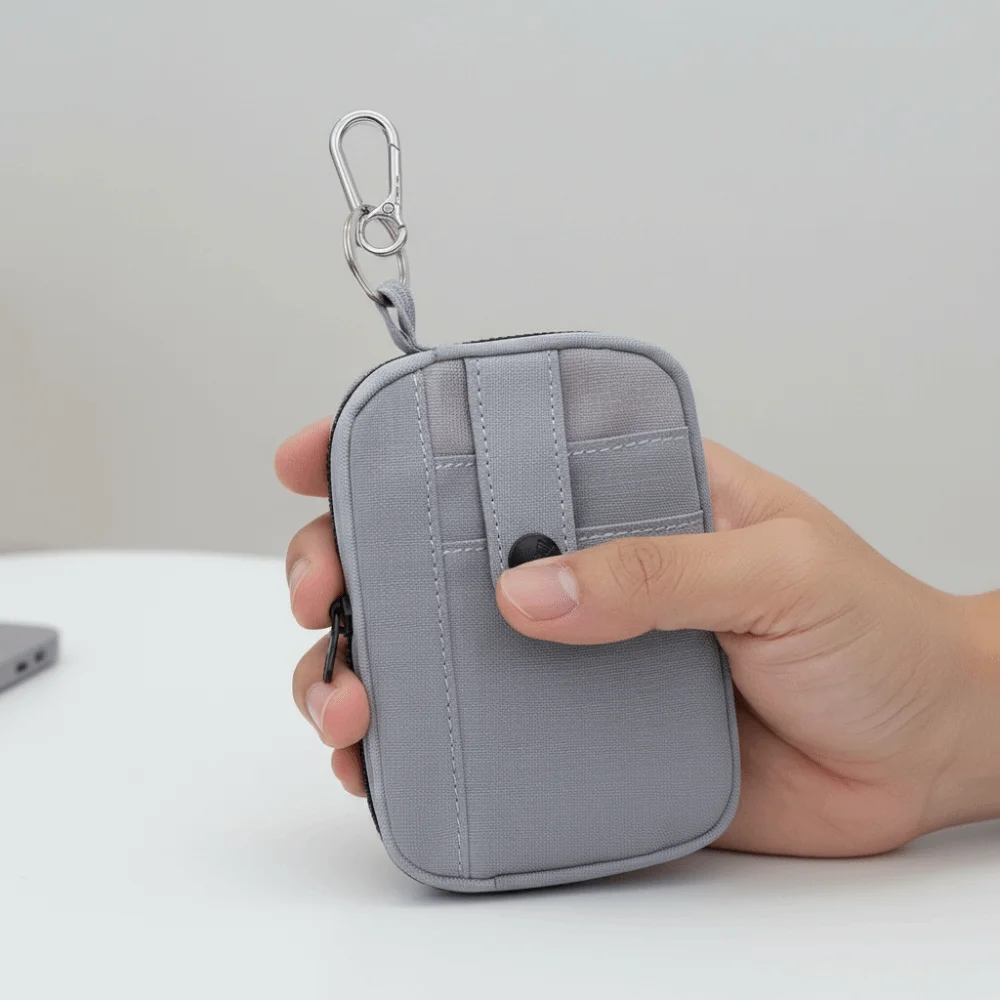 Przenośna, wielofunkcyjna płócienna portmonetka, jednokolorowa, zapinana na zamek, etui na słuchawki, lekka, kwadratowa mini torba do przechowywania, unisex.