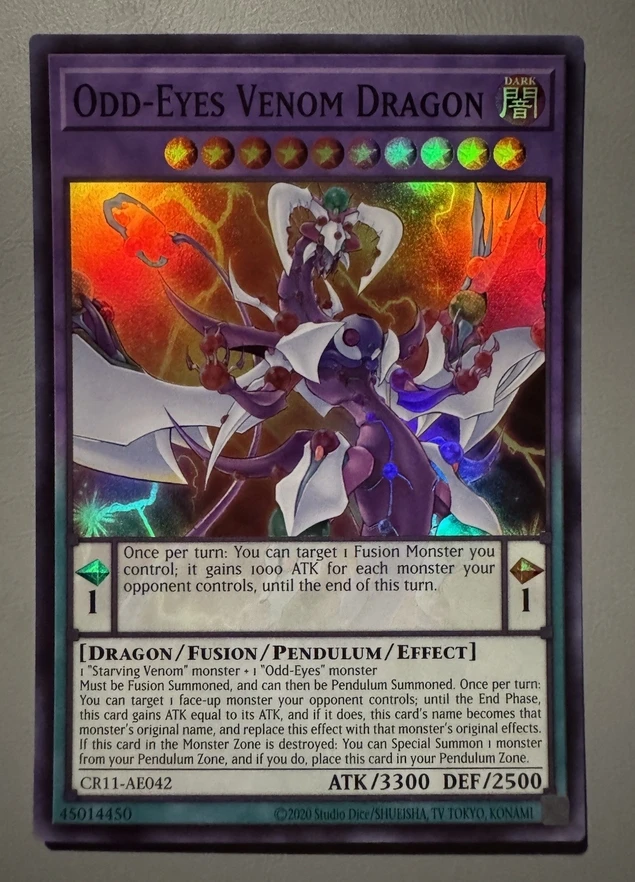 

Yugioh KONAMI Duel Monsters CR11-AE042 Odd-Eyes Venom Dragon Super Rare Asian English Collection Mint Card