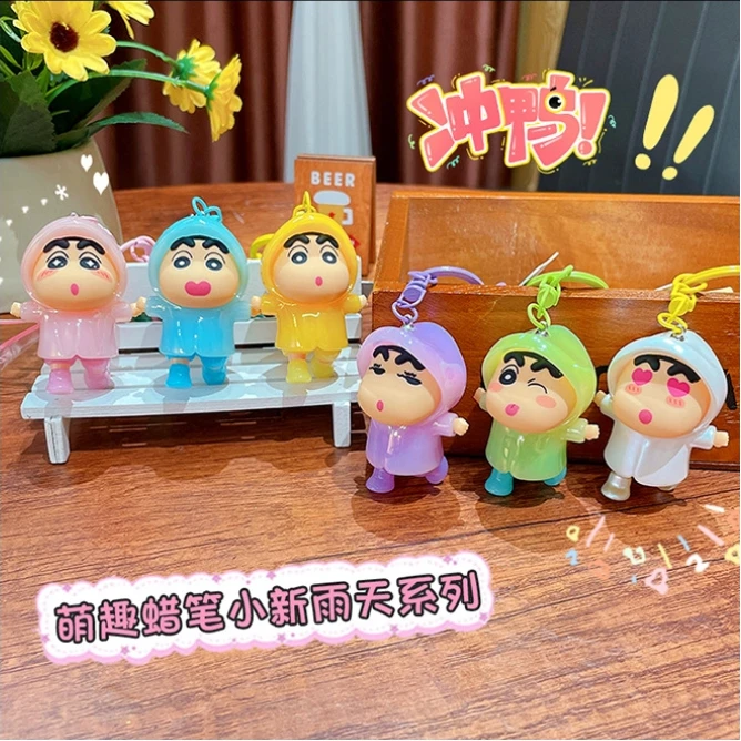 

Bandai New Crayon Shin-Chan Anime Figures Rainy Day Series Keychains Bag Pendant Cartoon Car Key Chain Kids Toys Fans Gift