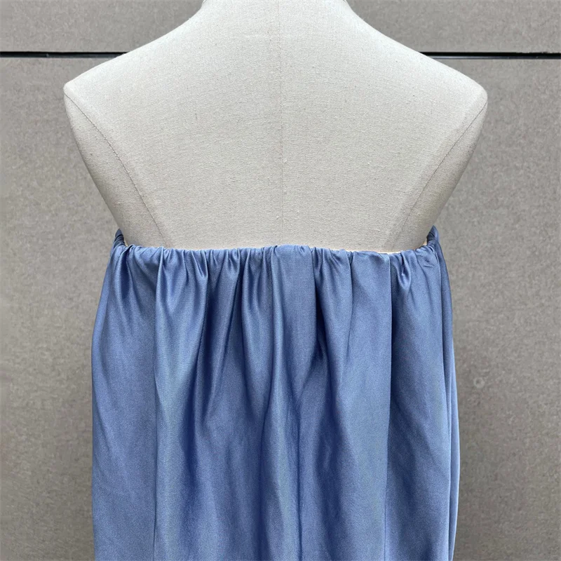 Chaleco de mujer 2026 primavera nuevo asimétrico ajustado top sin mangas Sexy sin espalda camiseta sin mangas plisada pecho abrazando top tops de mujer