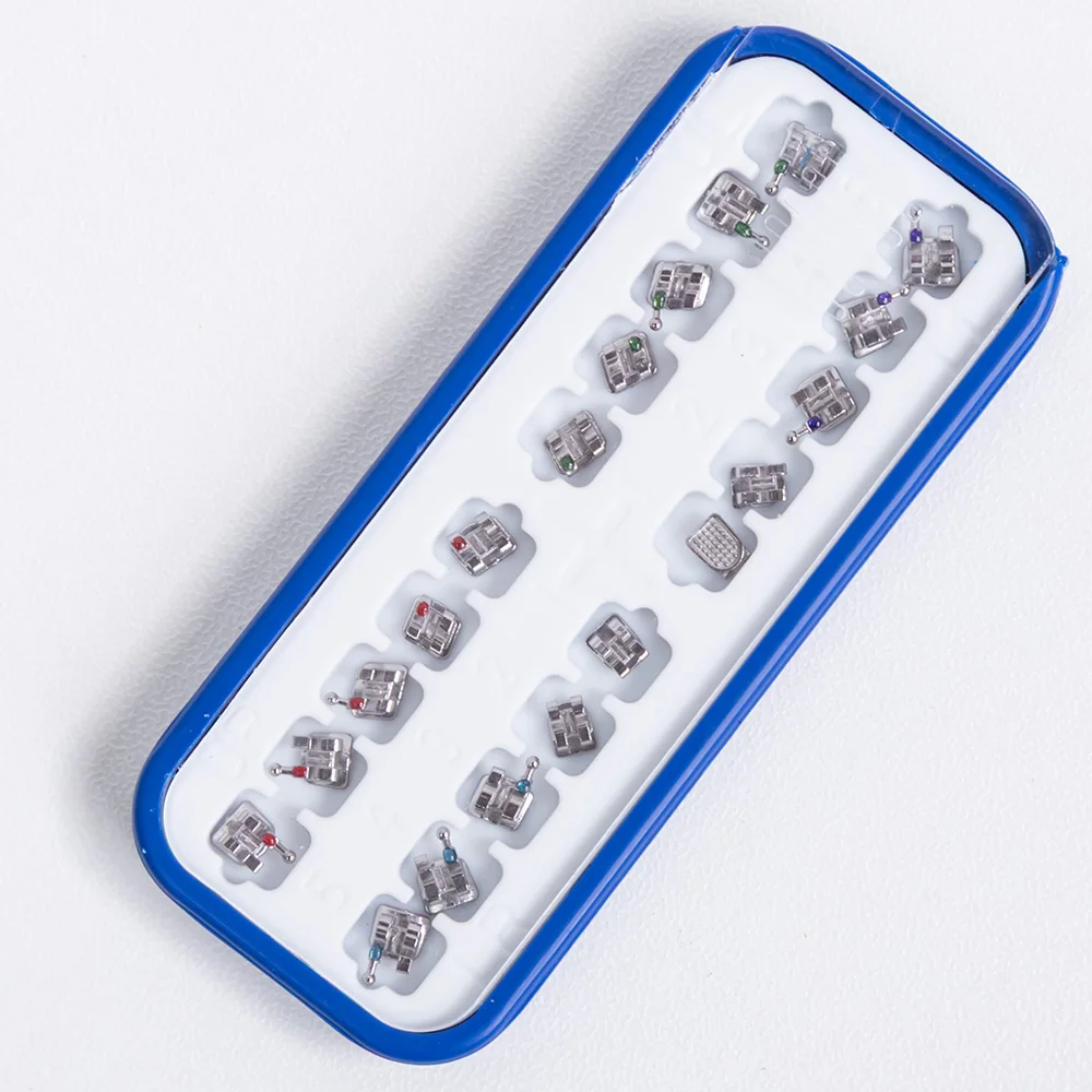 

20 шт./кор., стоматологические ортодонтические брекеты, брекеты MIM, моноблок, разделенная металлическая сетчатая основа, мини-ракт/MBT 0,022 крючки 345 стоматология