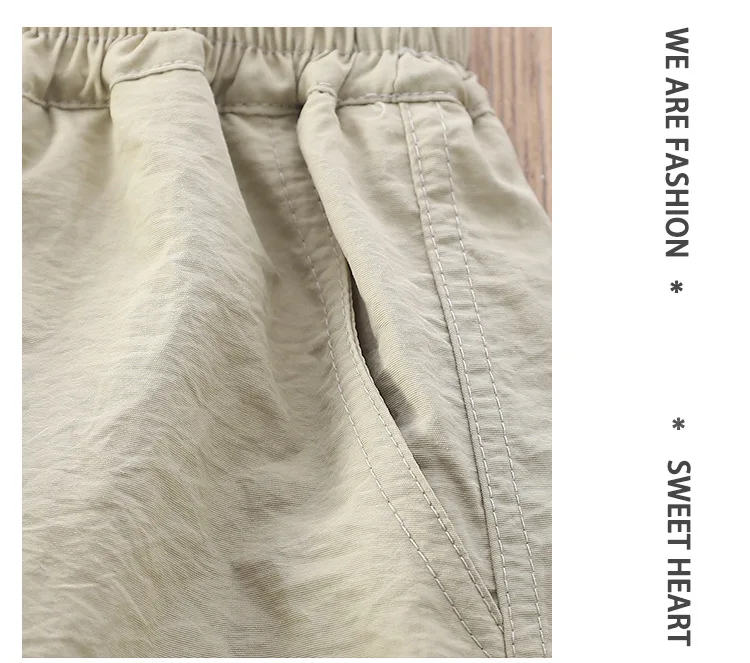 2026 Sommer Teenager Kinder Schnelltrocknende Shorts mit Hundestickerei Leichte Atmungsaktive Elastische Taille Freizeitshorts für Jungen Mädchen 4-14 Jahre – Detail 8