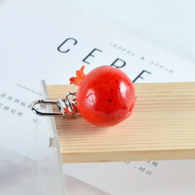 New Mini Pomegranate Keychain Creative and Cute Simulation Fruit Model Photography Props Bag Car Pendant Ornaments Gift Trinkets