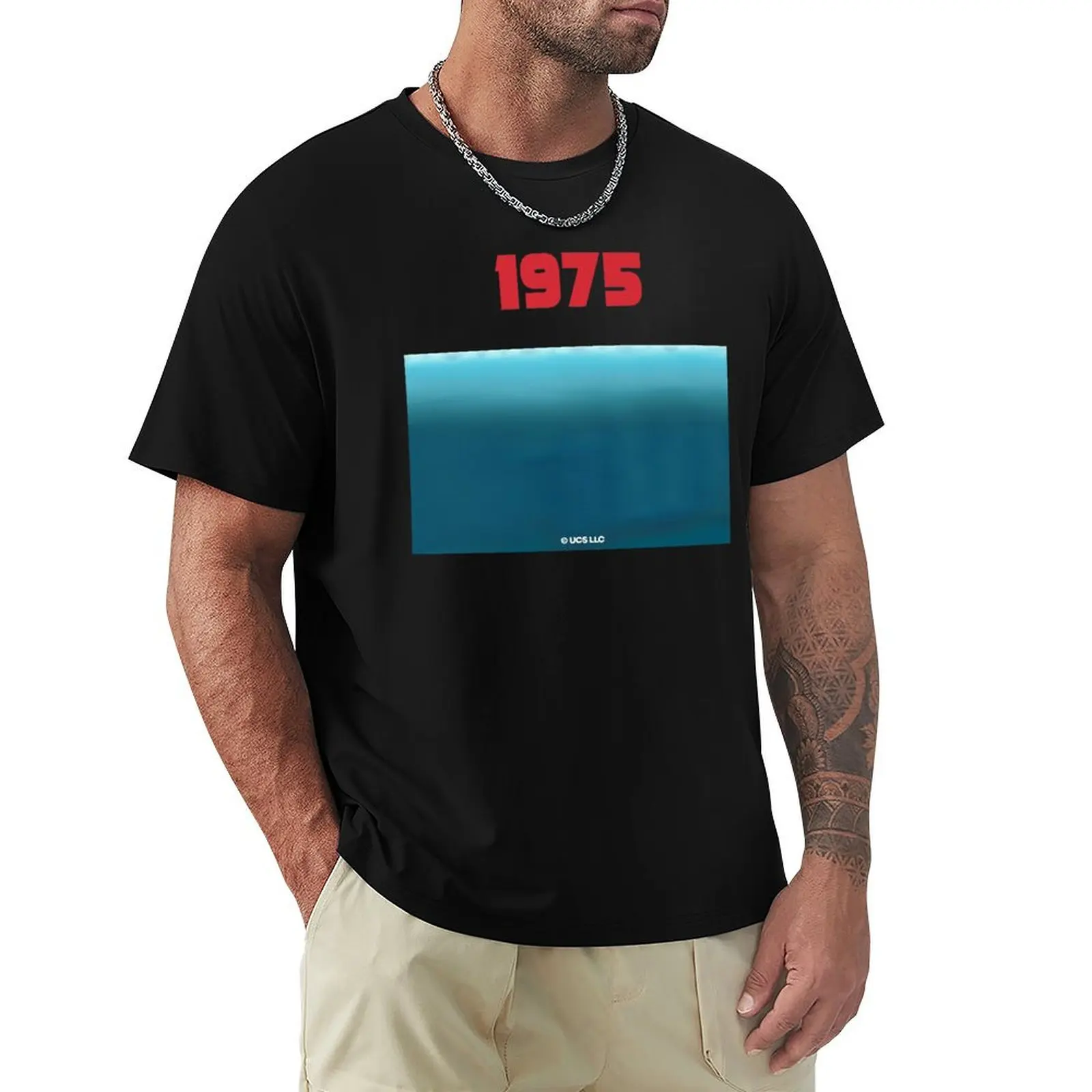 

Jaws movie 1975. Birthday party gifts. Officially licensed merch. T-Shirt Aesthetic clothing baggy shirts men tshirt