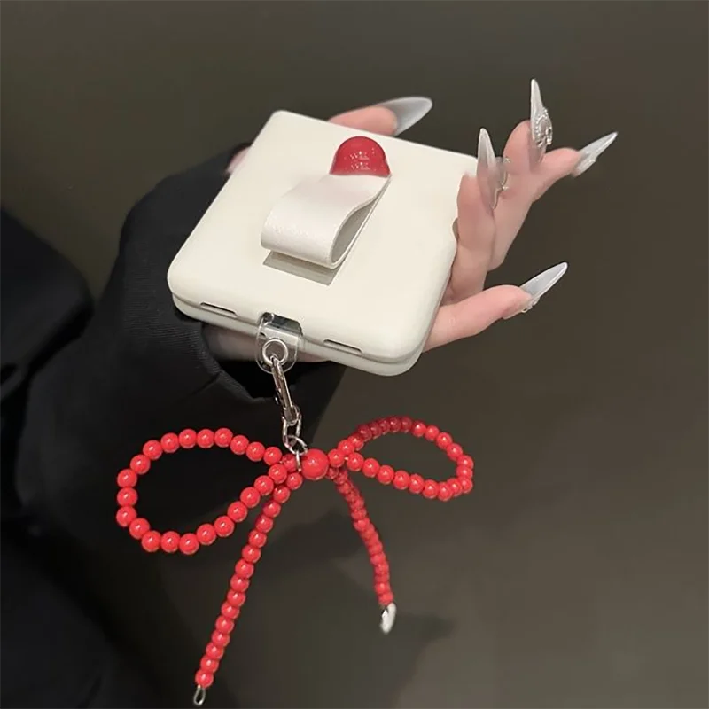 

Elegant White Wristband Flip Phone Cases For Samsung Z Flip6 5 4 Oppo N3 N3 Flip / Xiaomi Mix Flip Case With Red Bowknot Pendant