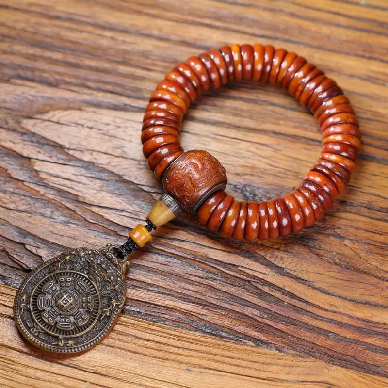 yak bone bead string paired with a Jiugong pendant, a Tibetan-style hand-held cultural item