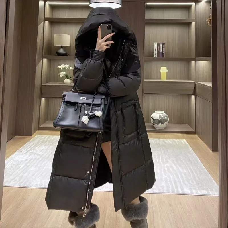 Pendolarismo alla moda ed elegante nell'autunno inverno Piumini da donna Soffio di fascia alta Piumino leggero di lusso con cappuccio in vita Muse