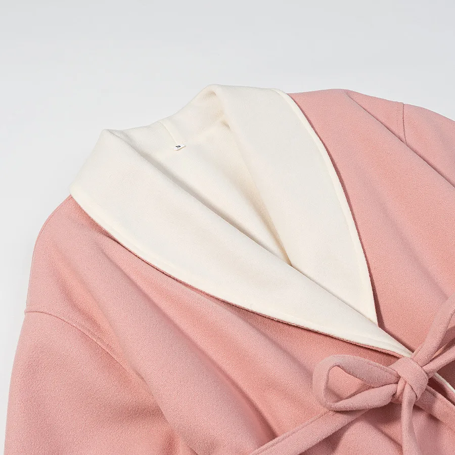 Nueva ropa de mujer europea y americana de otoño e invierno, temperamento femenino, puños peludos, chaqueta de abrigo de lana, 2025