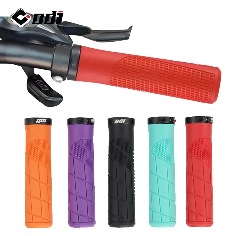Puños de bicicleta ODI Rubber con bloqueo, antideslizantes, a prueba de golpes, para manillar de bicicleta de montaña y carretera, en colores morado, rojo, naranja y verde.