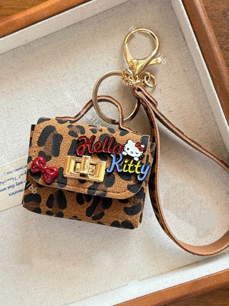 Sanrio Hello Kitty rétro imprimé léopard chat casque sac pendentif mode tendance porte-clés tempérament décoratif paquet créatif