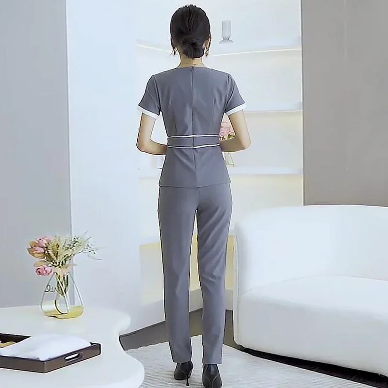 Prezzo all'ingrosso Set per scrub di bellezza Set uniforme da lavoro per hotel femminile Set per scrub Abito per massaggio ai piedi con scollo a V in due pezzi