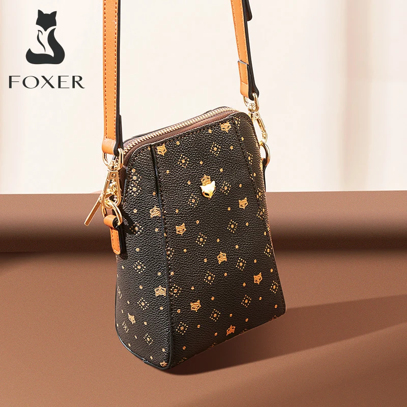 foxerブランド、女性用pvcモノグラム柄の携帯電話用バッグ。軽量で、肩から斜めがけできるデザイン。ファッション性の高い、長さ調節可能なストラップ付きの小型携帯電話用財布。