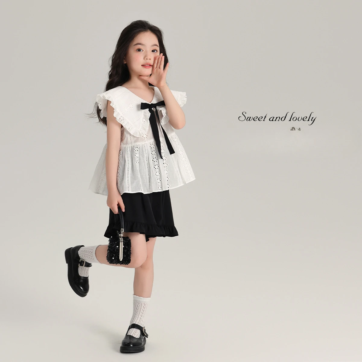 

Girl Shirt Top Korean Hollowed Out Wooden Ear Edge Bow Shirt Girls 2024 Summer New Children French Sweet Style Shirt Top