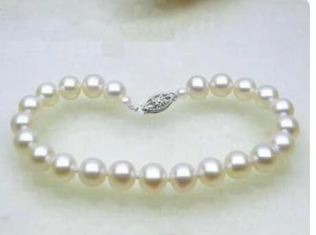 Aaa 7-8mm Nanhai true white pearl necklace 7.5-8 inch 14K white gold jewelry manufacturing.