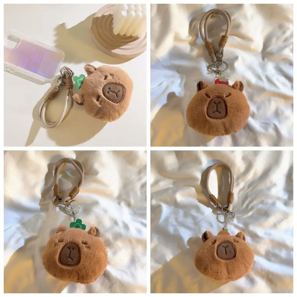 

Cute Plush Capybara Zero Wallet Tangerine Strawberry Cartoon Storage Bag Wrist Rope Doll Kids Portable Pouch Friends